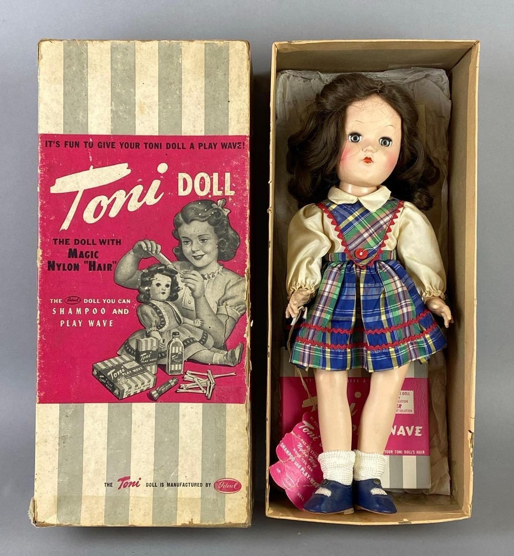 Vintage Ideal Toni P-90 Brunette Doll with Original Box: Green sleepy eyes, With Play Wave Kit, Some tears in box, Box taped, Box measures 15 1/2 x 6 3/4 x 4 inches, Doll measures 14 inches tall.