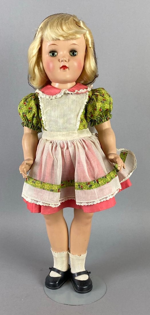 Vintage Ideal Toni P-92 Blonde Doll: Blue-Green sleepy eyes, Doll stand includes, Doll measures 19 inches tall.