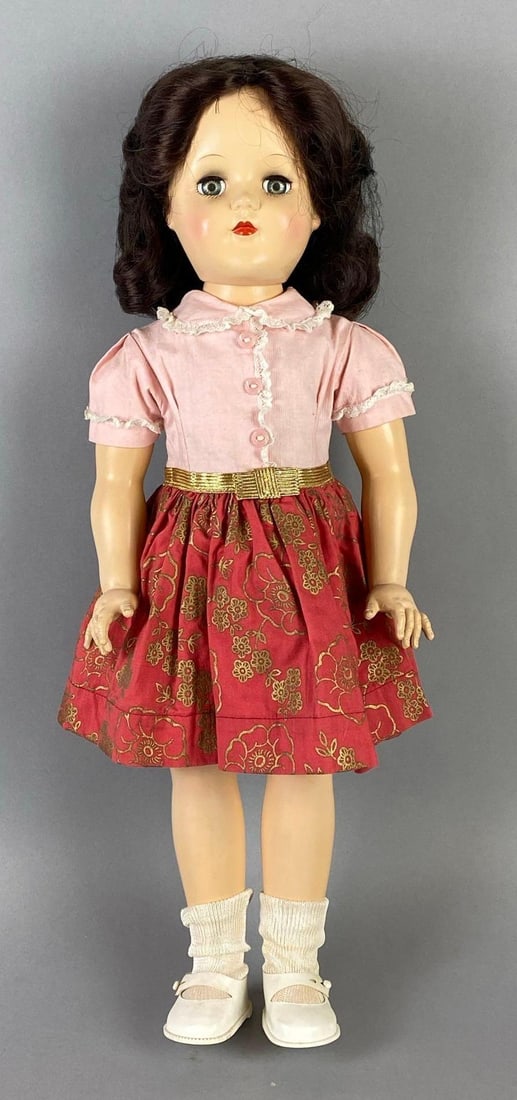 Vintage Ideal Toni P-93 Brunette Doll: Green sleepy eyes, Eyes cloudy, Doll measures 20 1/2 inches tall.