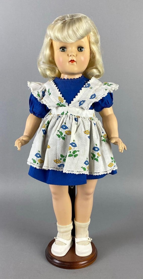 Vintage Ideal Toni P-92 Blonde Doll: Blue-Green sleepy eyes, Doll stand included, Doll measures 19 inches tall.