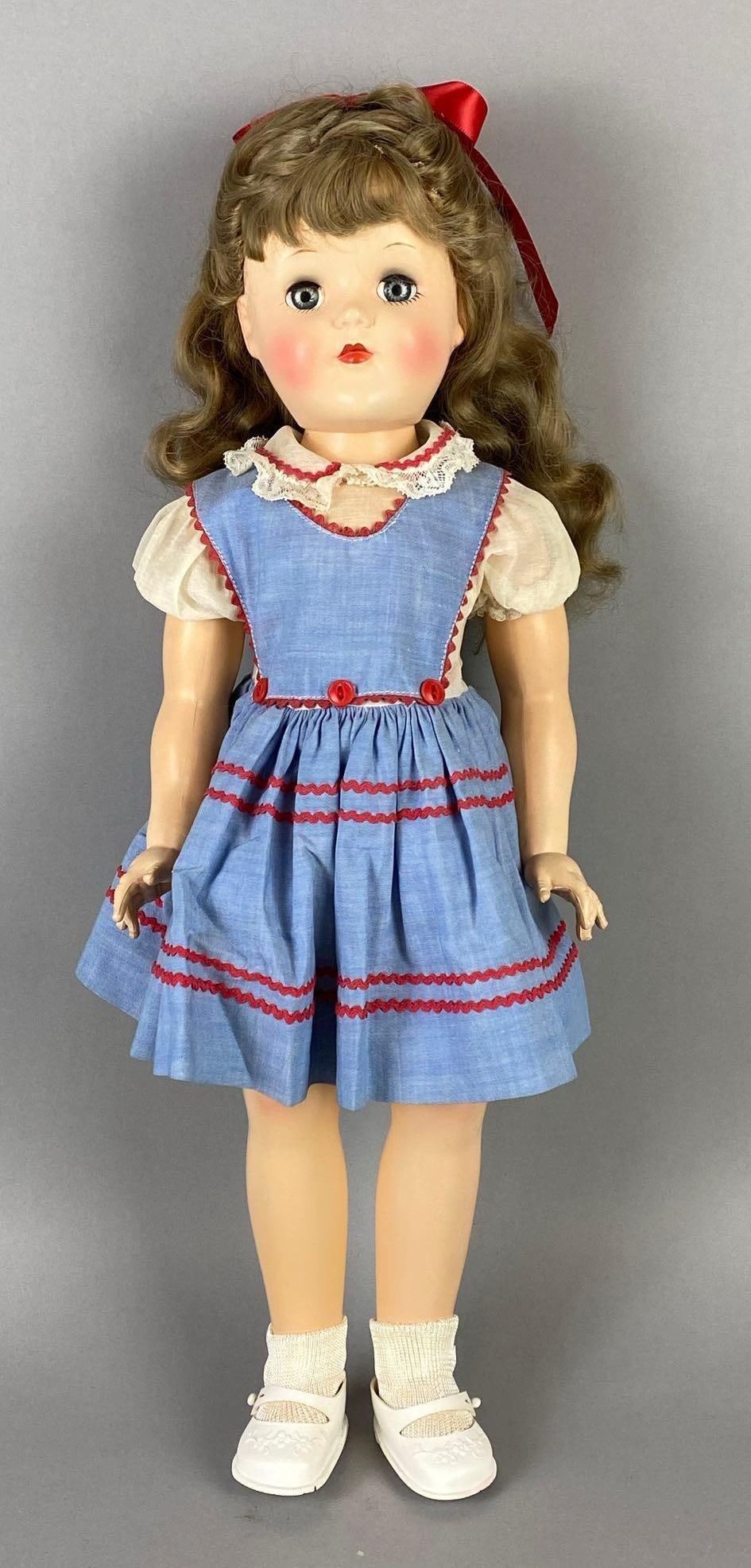 Vintage Ideal Toni P-93 Blonde Doll: Blue speed eyes, Doll measures 20 1/2 inches tall.