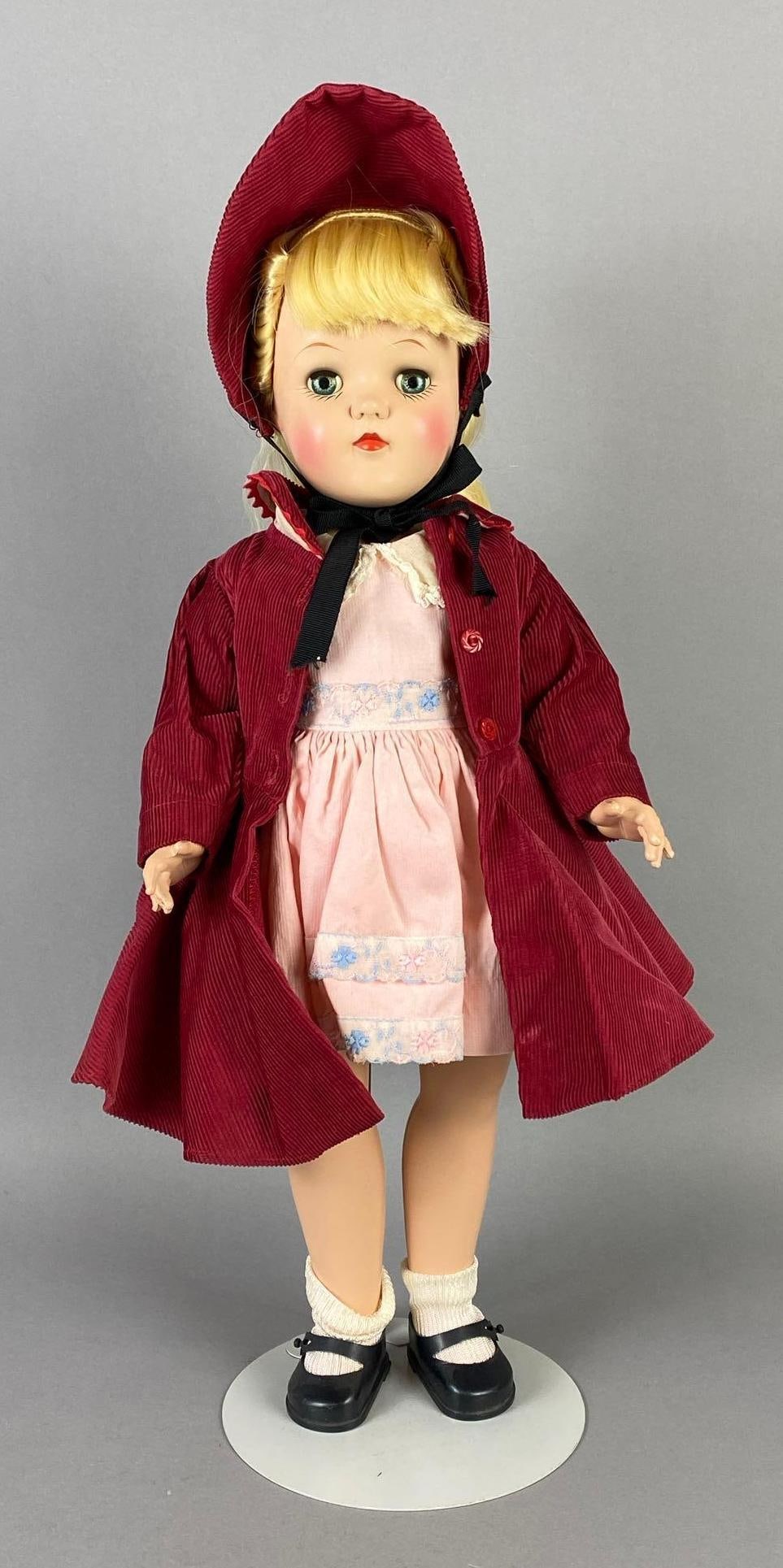 Vintage Ideal Toni P-92 Blonde Doll: Blue sleepy eyes, Doll stand included, Doll measures 19 inches tall.