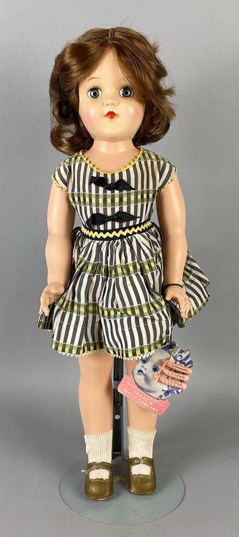 Vintage Ideal Toni P-93 Brunette Doll: Blue sleepy eyes, With Ideals Doll Curlers, Doll stand included, Doll measures 20 1/2 inches tall.