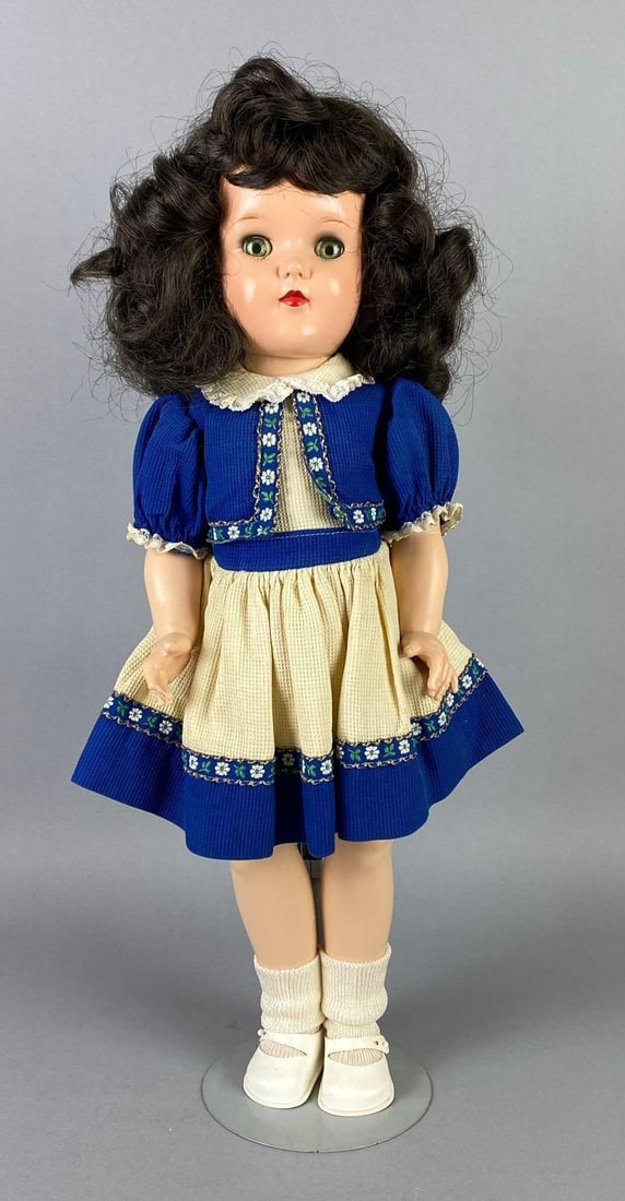 Vintage Ideal Toni P-92 Black Hair Doll: Green sleepy eyes, Cloudy eyes, With additional outfit, Doll stand included, Doll measures 19 inches tall.
