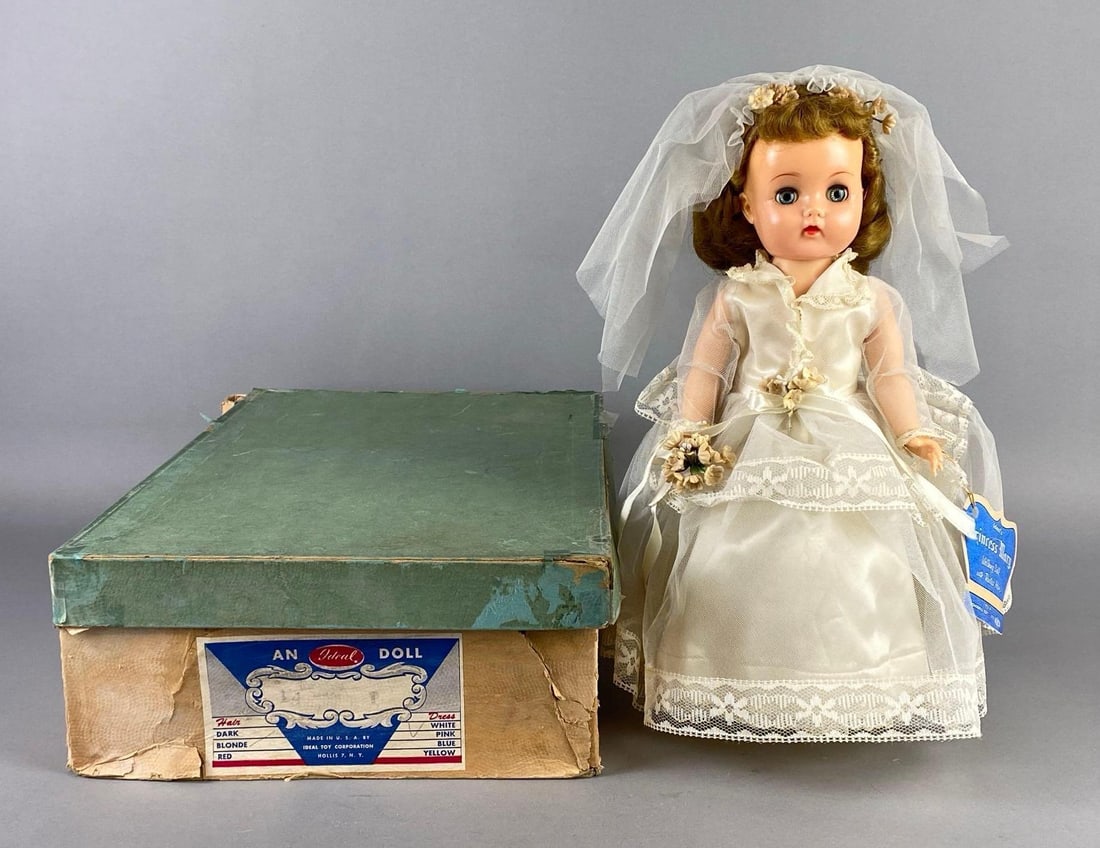 Vintage Odeal Princess Mary Blonde W-90 Walker Doll with Original Box: Blue sleepy eyes, With reproduction tag, Box with some tears and tape, Box measures 18 x 11 x 5 inches, Doll measures 14 1/4 inches tall.