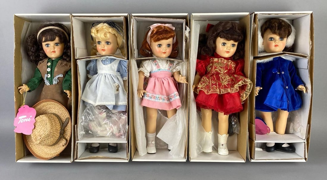 Group of 5 Modern Effanbee Toni Dolls with Original Boxes: Includes Toni in Wonderland, Sew for me Toni, Crisp and Cute, and more, Boxes measure 16 x 6 x 4 1/4 inches, Dolls measure 14 1/4 inches tall.