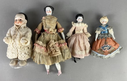 Group of 4 Porcelain Bisque Dolls