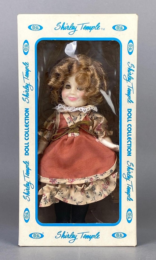 Vintage Ideal Doll Collection Shirley Temple Doll with Original Box: 1982, Brown sleep eyes, Box measures 9 3/4 x 5 x 3 inches, Doll measures 8 inches tall.