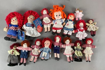 Group of Raggedy Ann and Andy Dolls