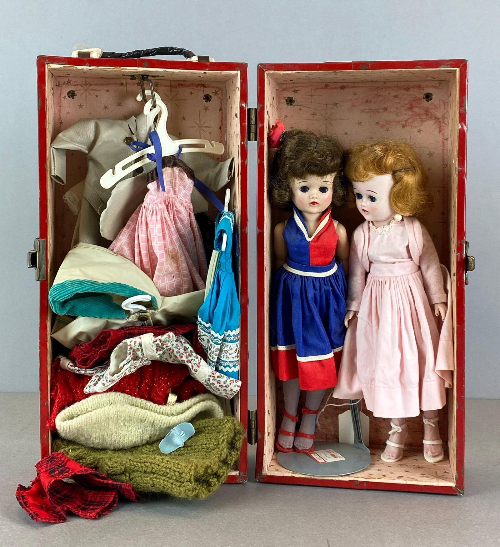 Group of 2 Vintage Vogue Jill Dolls with Accessories: With travel case, both dolls marked vogue and Jill, includes dresses, hats, skirts and more, each doll measures 10 inches tall