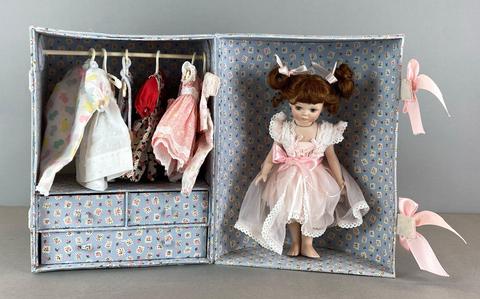 1997 Limited Edition Marie Osmond Porcelain Doll Set: Limited edition No. 95 of 5000, unknown set completion, includes pajamas, dress, robe and more, doll measures 10 inches tall