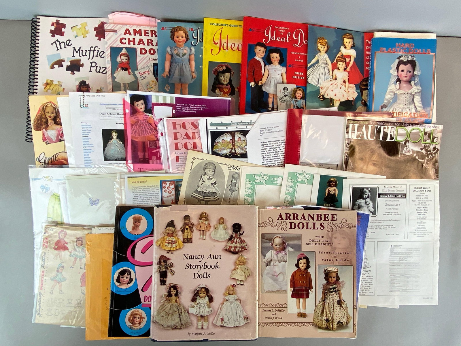 Group of Vintage Paper Doll Ephemera: Includes reprints and webpage printouts, includes Arranbee dolls value guide, Nancy Ann storybook dolls, haute dolls and more, largest measures 11 x 9 inches
