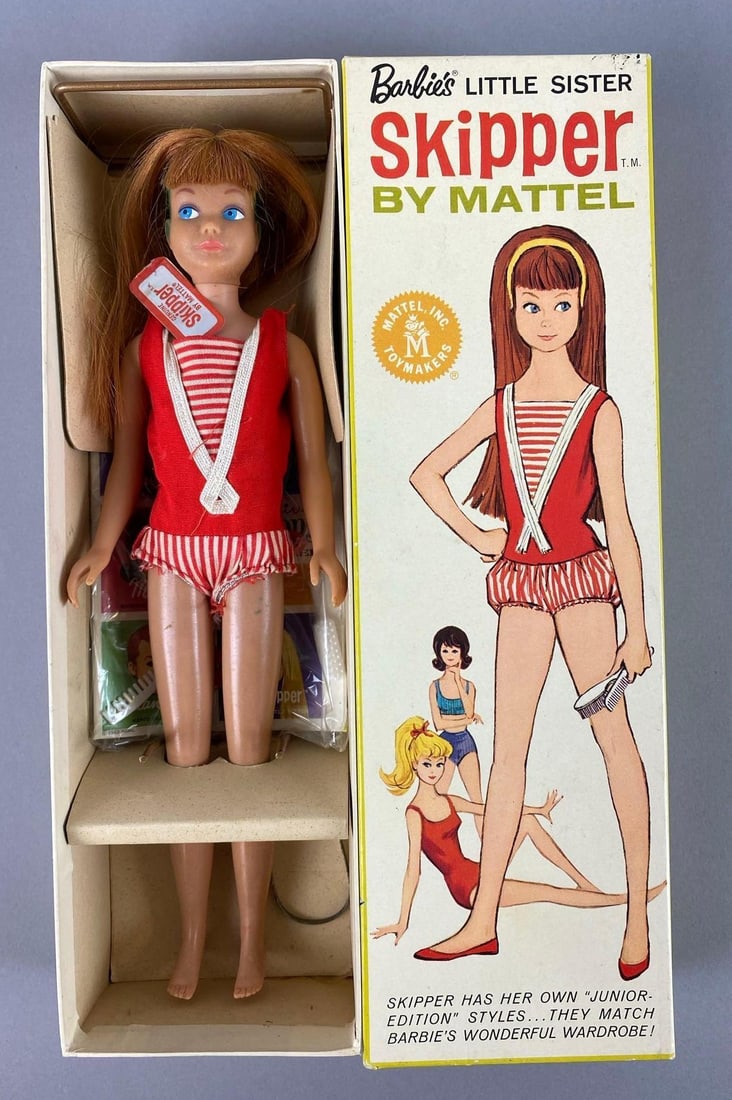 Vintage Mattel Skipper Redhead Fashion Doll: 1963 Long hair. Stock No 0950 includes stand, original box and tag. Doll is greasy and has greening ears. Box measures 10 x 3 x 2 inches.