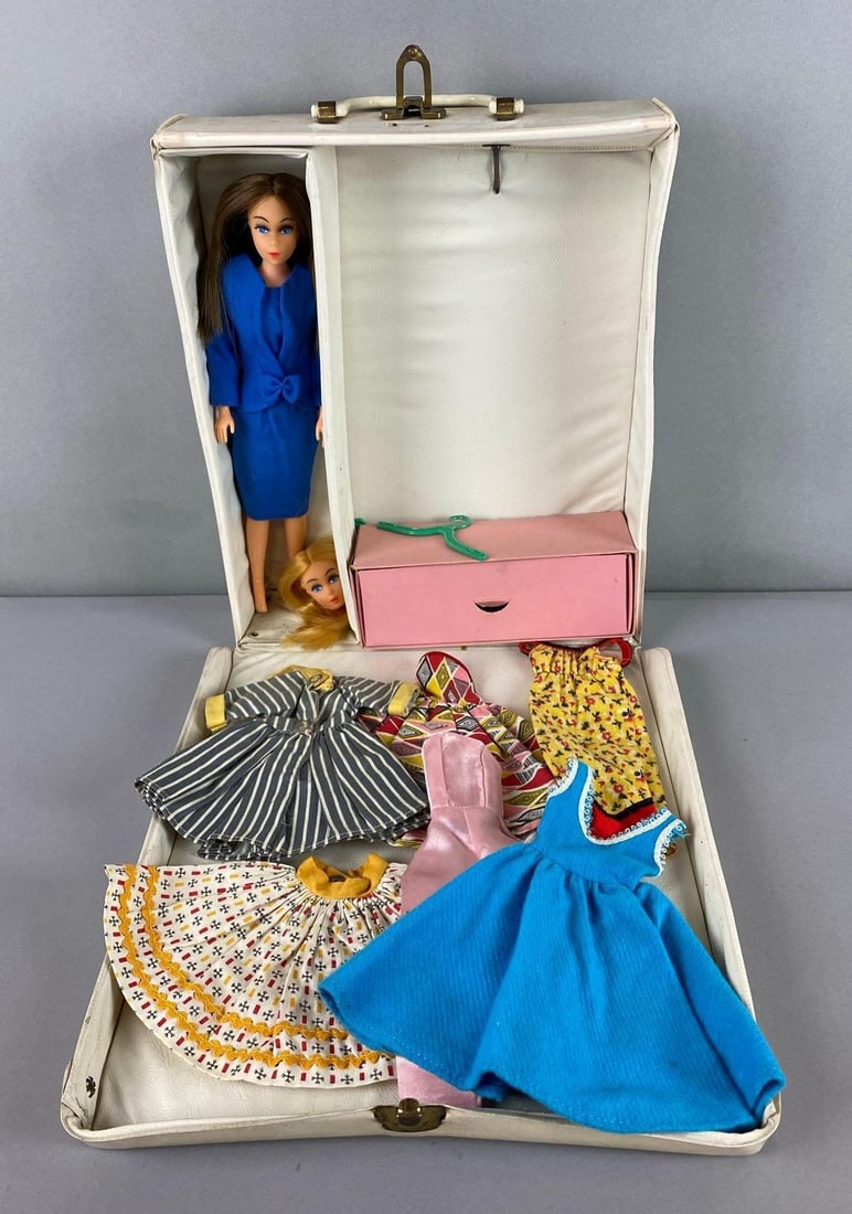 Vintage Tina Marie Doll Case and More: Includes a brunette Fashion Doll, Extra head, outfits and more. Wear consistent with age. Case measures 23 1/2 x 10 1/2 x 3 inches