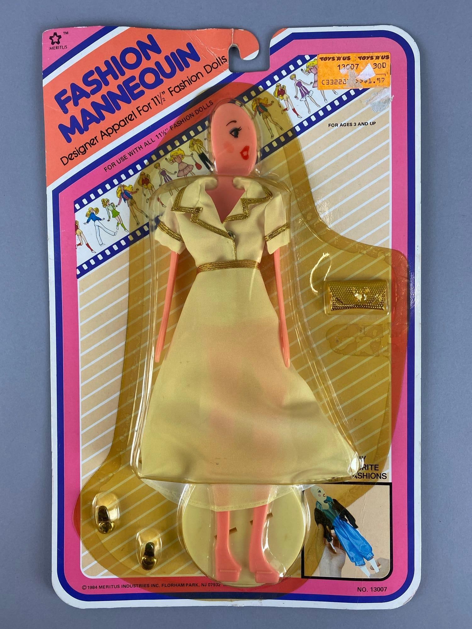 Meritus Fashion Mannequin: 1984 Stock No 13007. apparel for dolls 11 1/2 inches. Window has yellowed .In original packaging. Measures 14 x 9 x 1 inches.