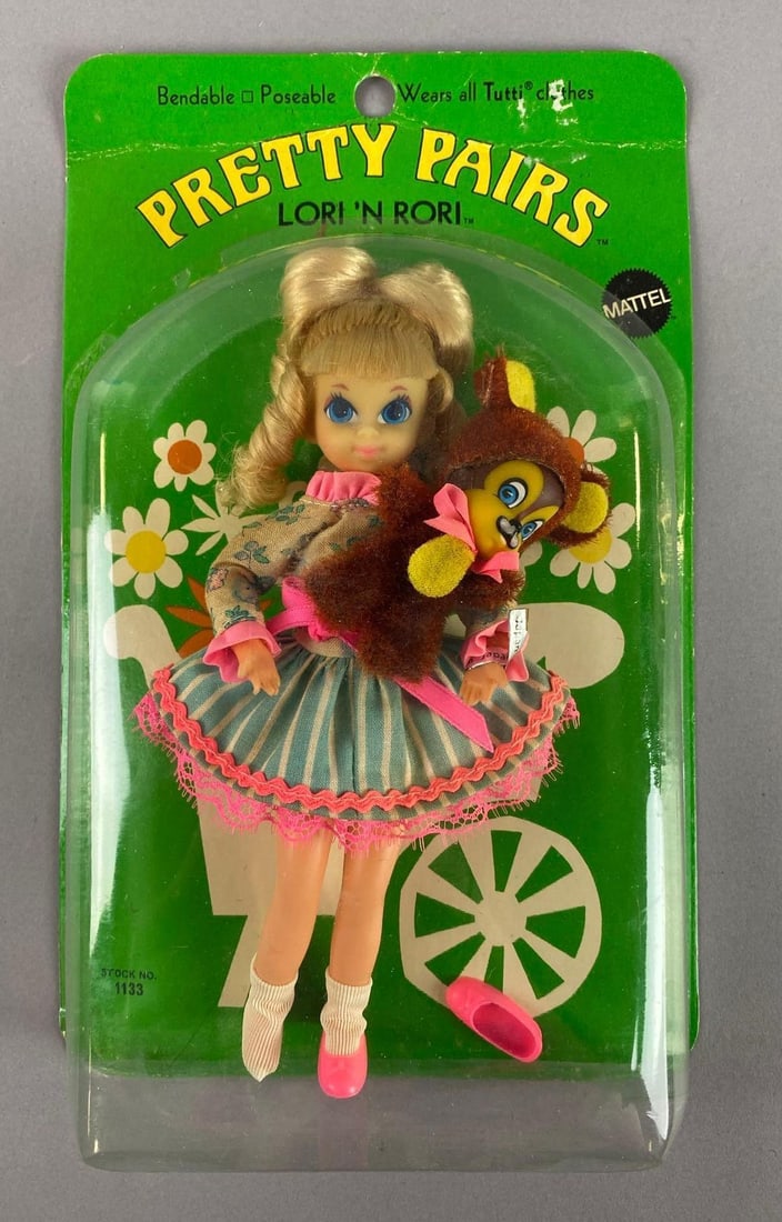 Vintage Mattel Pretty Pairs Lori n Rori Doll: 1969 Stock No. 1133. In original packaging. Blister has separated from backing. Measures 9 1/4 x 6 3/4 x 1 1/2 inches.