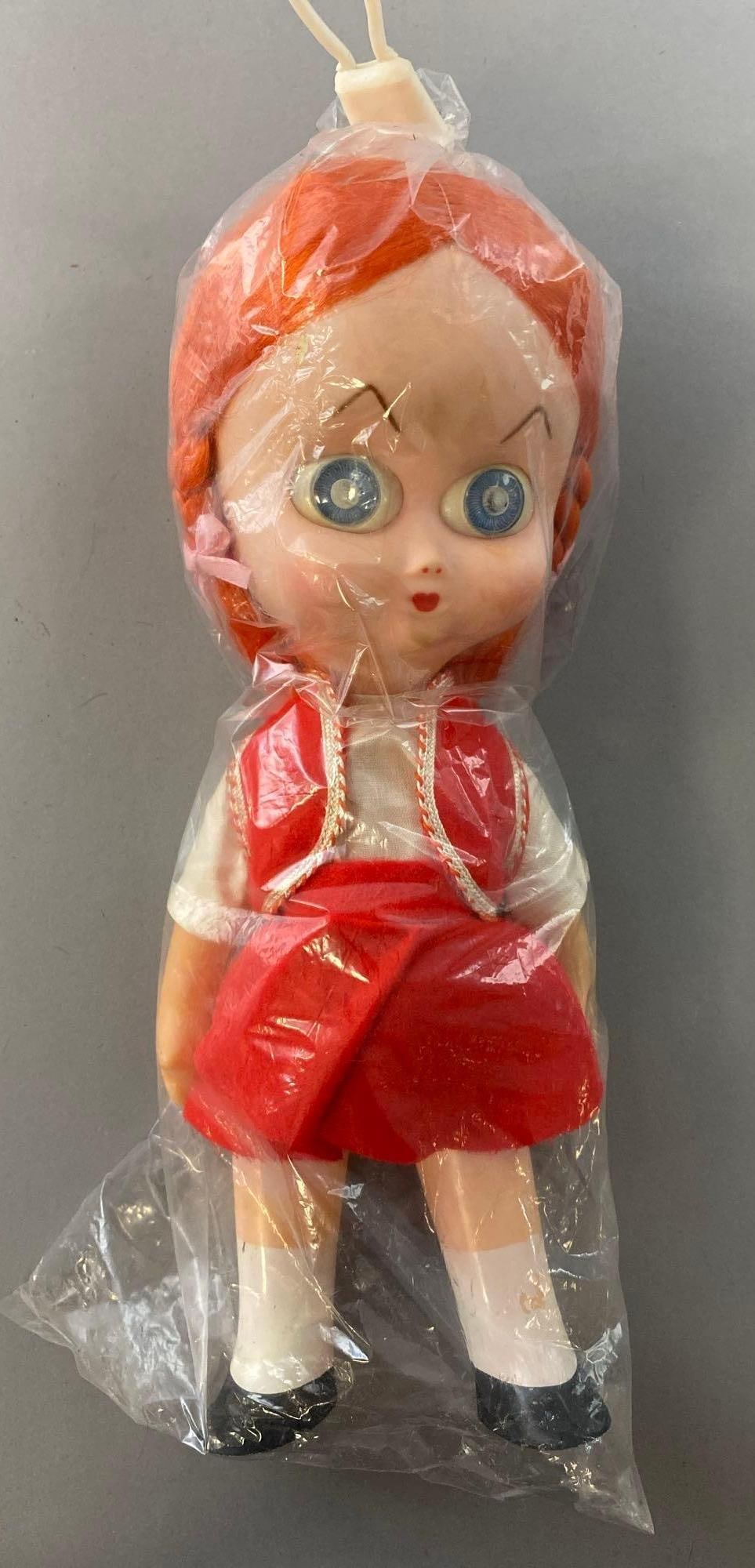 Vintage A.D. Sutton & Sons Redhead Dedo Doll: Piggy tails. Plastic. Measures 11 inches tall.