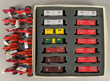 Group of N Scale Train Cars and HO Scale Die-Cast Tractors