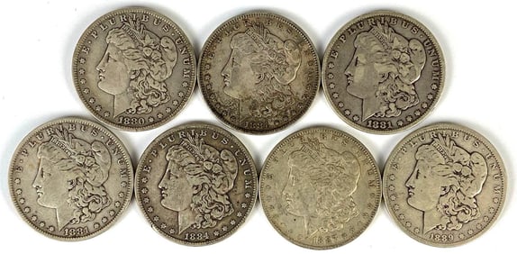 Group of 7 1880's US $1 Morgan Silver Dollars