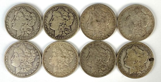 Group of 8 1900-O US $1 Morgan Silver Dollars