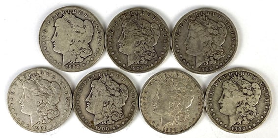 Group of 7 1900-O US $1 Morgan Silver Dollars