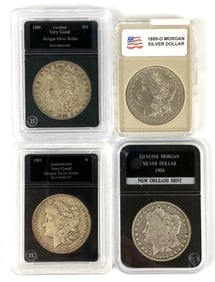 Group of 4 Slabbed Morgan Silver Dollars