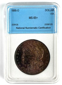 NNC Graded 1885-O US $1 Morgan Silver Dollar MS65+