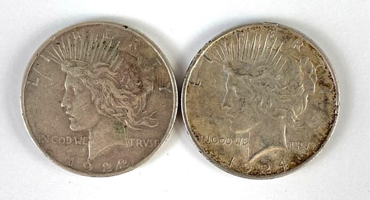 Group of 2 1920s US $1 Peace Silver Dollars