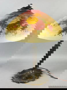 Arts and Crafts Reverse Painted Glass Roses Shade Table Lamp: With floral motif cast metal base, In working condition, Two small chips on inside of rim, Measures 23 x 16 x 16 inches.