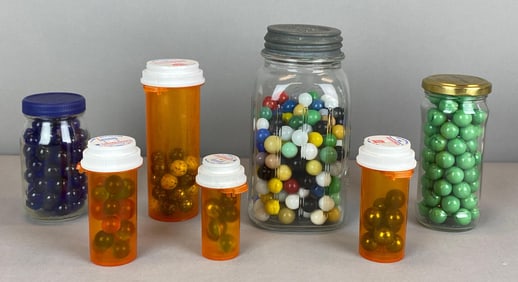 Group of 7 Jars of Assorted Glass Marbles