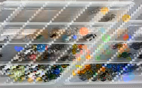 Group of 160+ Assorted Glass Marbles: Includes cats eye, clear and more, sizes range from 12 - 25 mm across