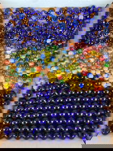Group of 140+ Assorted Glass Marbles and Beads: Includes blue, cats eyes, colored and more, sizes range from 12 - 25 mm across