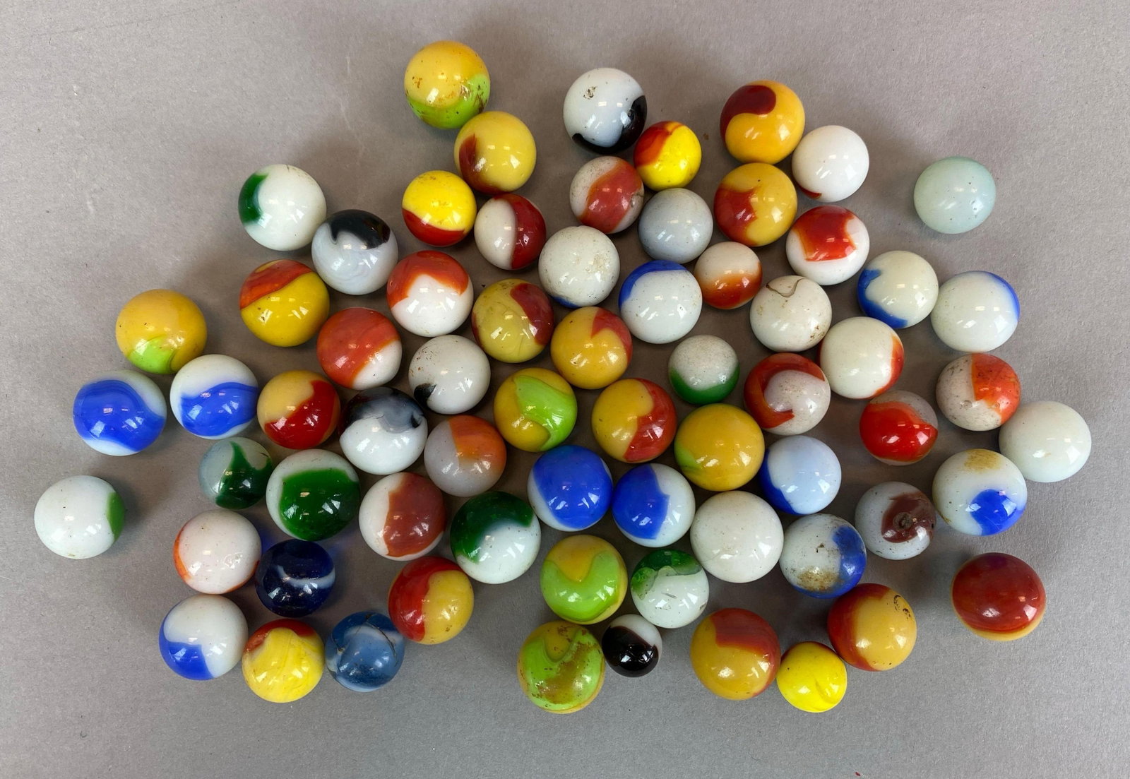 Group of 60+ Assorted Swirl Glass Marbles: Sizes range from 12 - 17 mm across