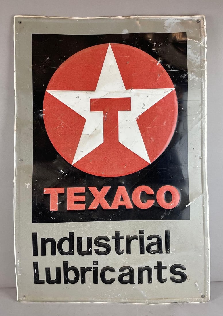 Texaco Industrial Lubricants Embossed Metal Advertising Sign: Heavily dented and warped, measures 36 x 24 inches