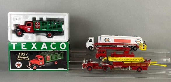 Group of 4 Die-Cast Trucks