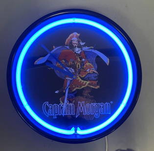 Captain Morgan Light-Up Advertising Clock: Working condition light and clock, measures 15 x 2 1/2 inches