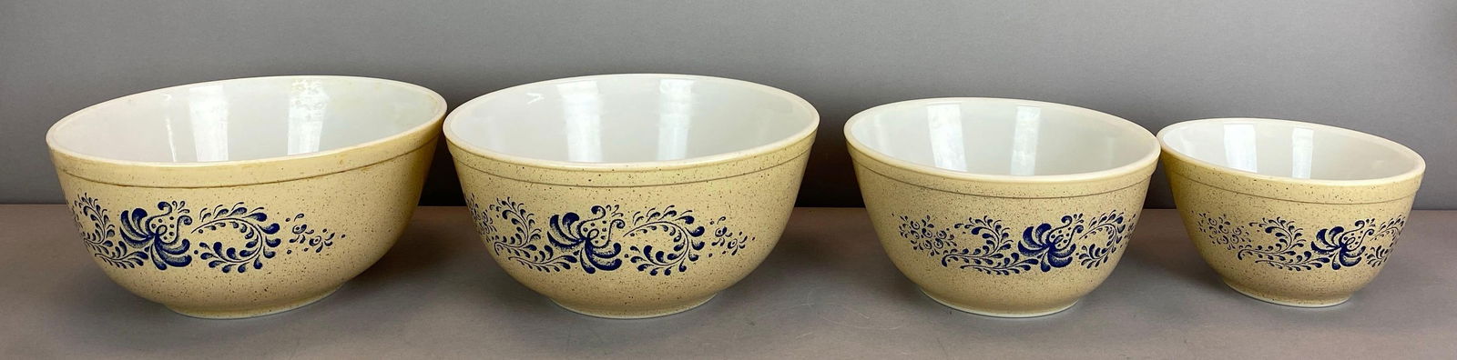 Set of 4 Pyrex Faux Stoneware Mixing Bowls: All marked on base, largest measures 4 x 8 3/4 inches