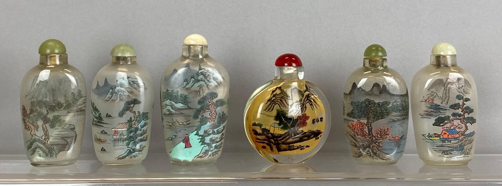 Group of 6 Chinese ROG Landscape Snuff Bottles: Reverse on glass, largest measures 3 x 2 1/2 x 1 inches
