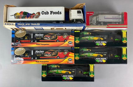 Group of Die-Cast Semi Trucks and Trailers