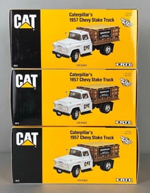 Group of 3 ERTL CAT Caterpillar Die-Cast 1957 Chevy Stake Trucks