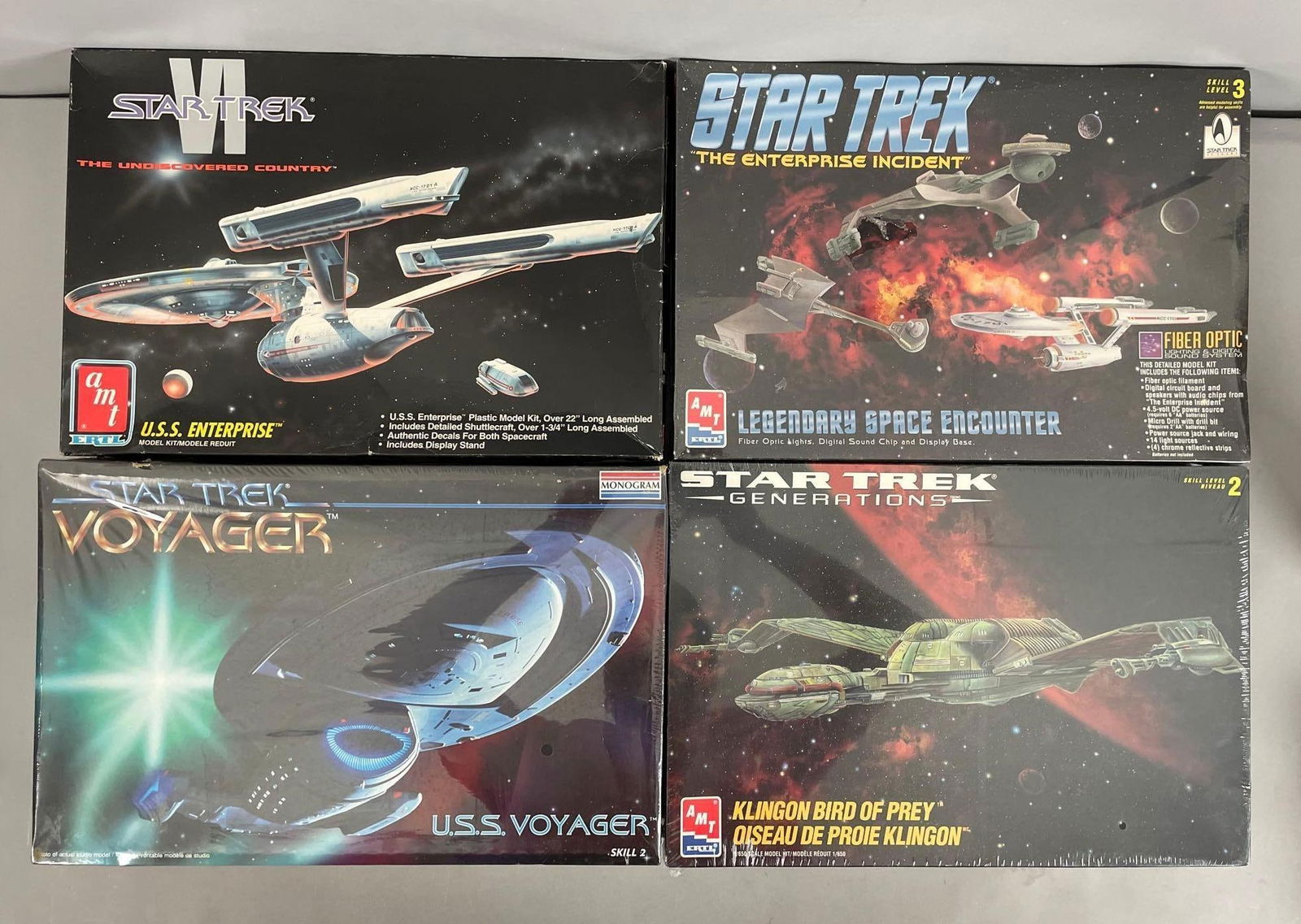Group of AMT Ertl Star Trek Ship Model Kits: Includes enterprise, voyager, Klingon bird of prey, most sealed, other appears complete