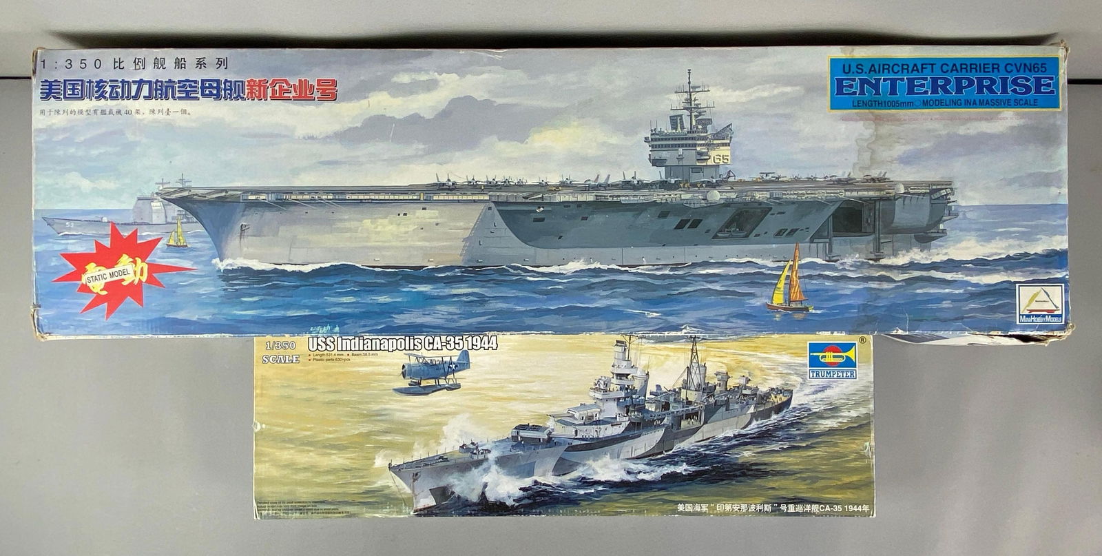 Group of 2 US Naval Ship Plastic Model Kits: Includes USS Indianapolis CA-35 1944 and U.S. Aircraft Carrier CVN65 Enterprise, USS Indianapolis is sealed, Enterprise seems complete, moisture damage present on box of enterprise, US Enterprise is 1