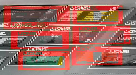 Group of 6 Lionel O Scale Train Cars: All in original boxes, includes Hershey billboard reefer, Northern pacific Bay window Caboose, Denver Rio grande Bix car and more, longest measures 13 1/2 inches in length