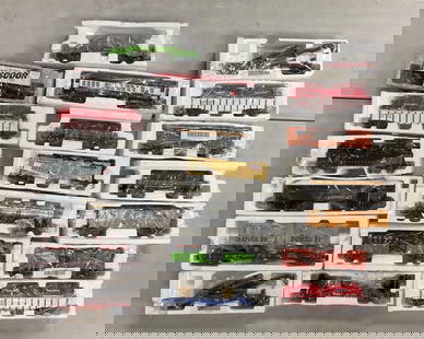 Group of O Scale Train Cars: Includes Recovery unit flat car, Boston Red Sox Passenger Car, Twizzlers car and more, all contained in original foam