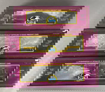 Group of M.T.H. O Scale Train Cars: Includes Union Pacific crane car, GE flatcar with transformer, original packaging