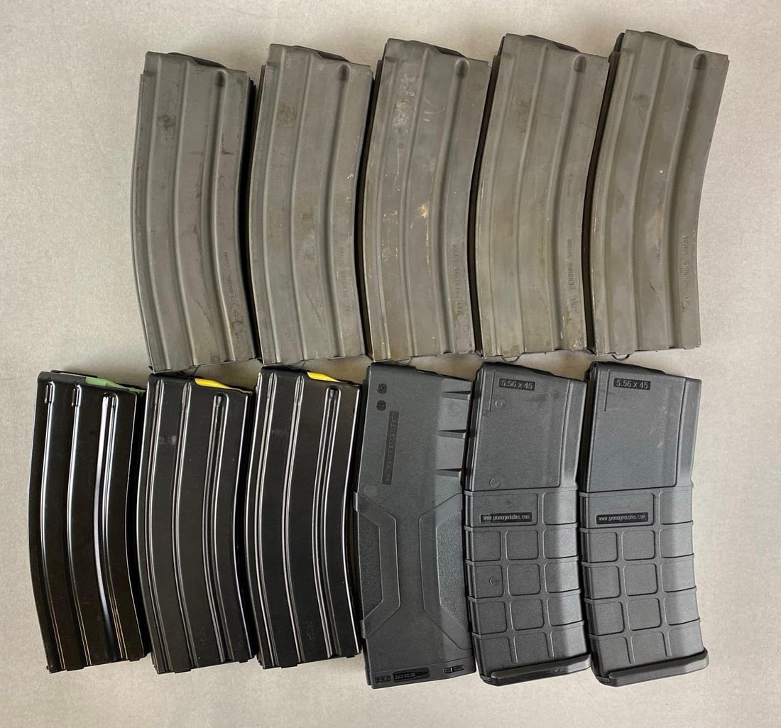 Group of 11 Assorted 223/556 Banana Magazines: Illinois Residents May Not Participate In This Lot (Illinois Banned Item). Largest measures 7 1/2 inches long.