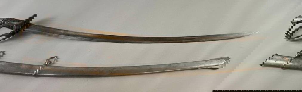 Civil War Era Tiffany and Co./PDL Sword with Scabbard: Makers marks stamped on both sides of blade, Some chips in blade, Sword measures 41 inches long, Blade measures 35 1/2 inches long.