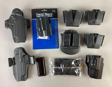 Group of Kydex Firearm Holsters and More