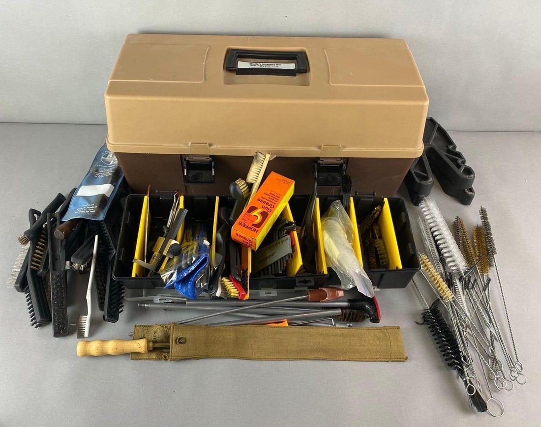 Group of Gun Cleaning Tools and More: Includes Hex keys, wire brushes, Shooters accessory box and more. Largest item measures 9 x 22 x 9 inches.