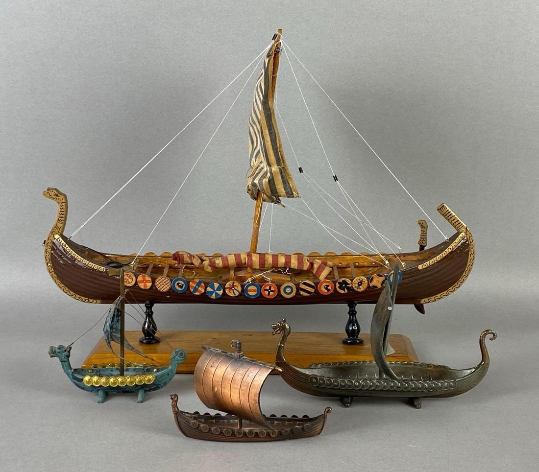 Group of 4 Viking Ship Models and Figures: Includes Wood Model, and Cast Metal ships, Largest measures 12 x 15 1/2 x 6 inches.